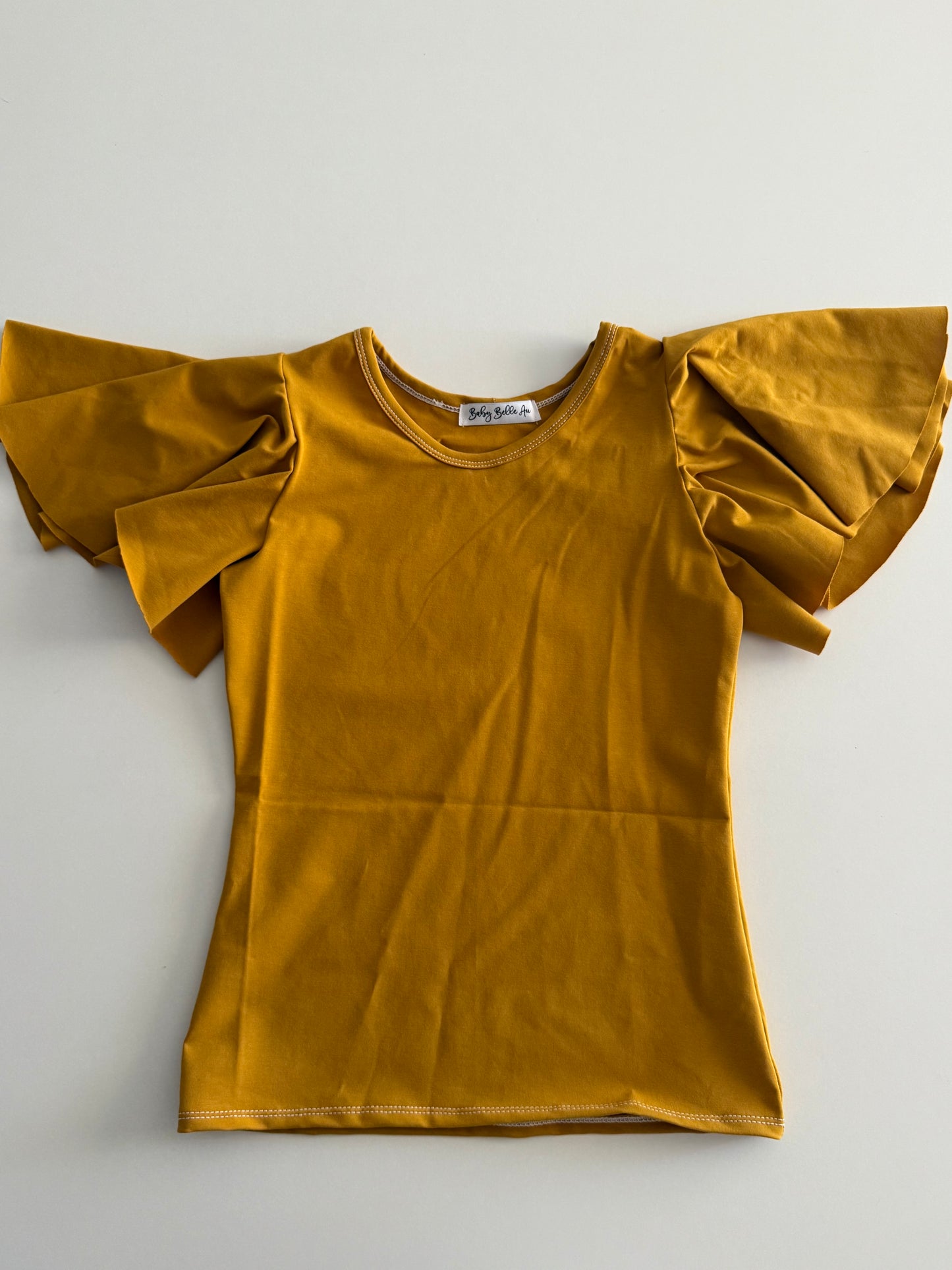 BUTTERFLY FLUTTER TOP | MUSTARD