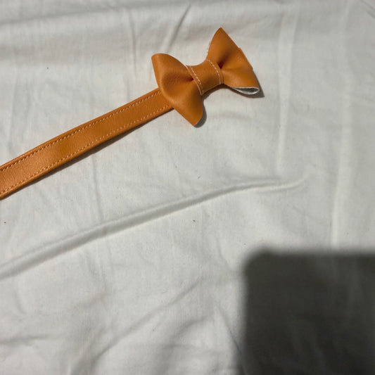 ADJUSTABLE BOW BELT | SHERBET ORANGE FAUX LEATHER